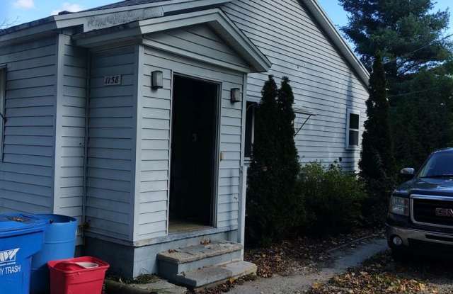 Adorable Home in Cadillac on Clam Lake Greenway Trail photos photos