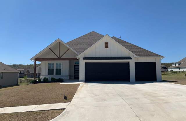 Beautiful home tucked in the rolling wooded hills of Catoosa photos photos