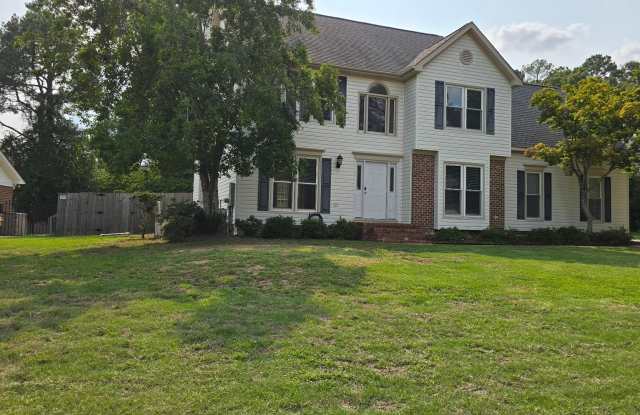 Welcome home to this beautiful rental located just off Country Club Drive on the highly sought-after north side of town! Gallery 4