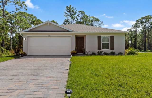 Welcome to your dream home in Lehigh Acres! - 923 Hooper Avenue, Lehigh Acres, FL 33974