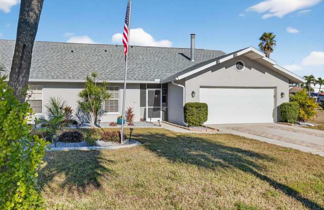 2 Bedroom 2 bath Oversized Duplex with 2 Car Garage - 5731 Rose Garden Road, Cape Coral, FL 33914