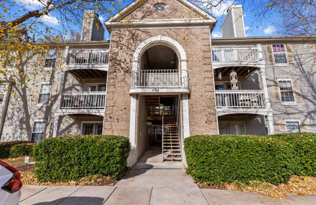 Top Floor Condo with Fireplace and Open Floorplan! Assigned Parking! photos photos