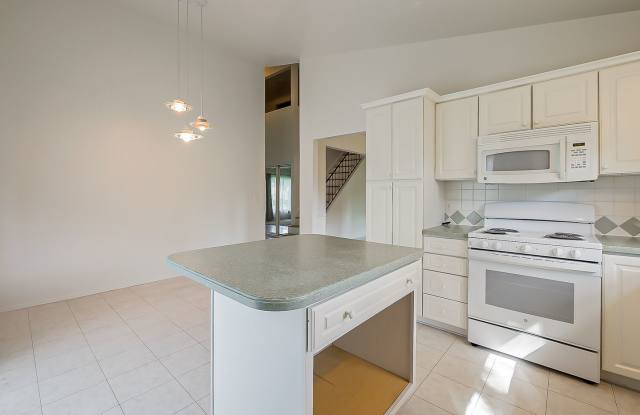 Spacious & Updated Novi Colonial | Vaulted Ceilings, Fireplace & Private Deck Gallery 4