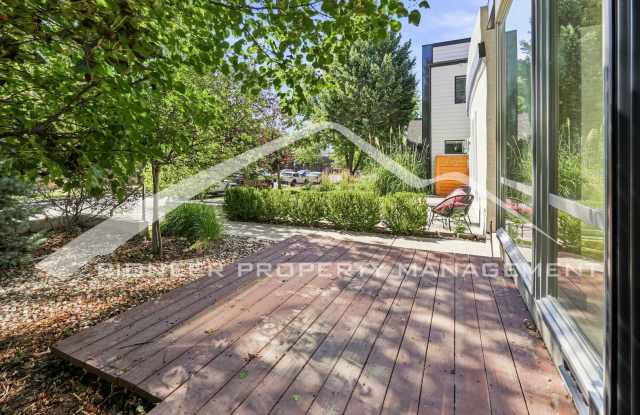 Lovely Single Family Home With Central AC, Rooftop Patio, and a 2 Car Garage! Gallery 3