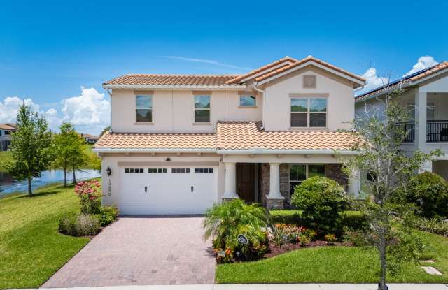 Luxurious 5 Bed/5Bath Home in the Sought-After Eagle Creek Community in Lake Nona! photos photos
