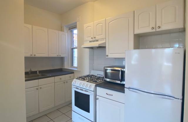 Large, sunny 2 bed unit with heat and water included. photos photos