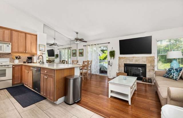 Serene Furnished 1/1 Top-Floor Coastal Condo with Balcony and Covered Parking Gallery 1
