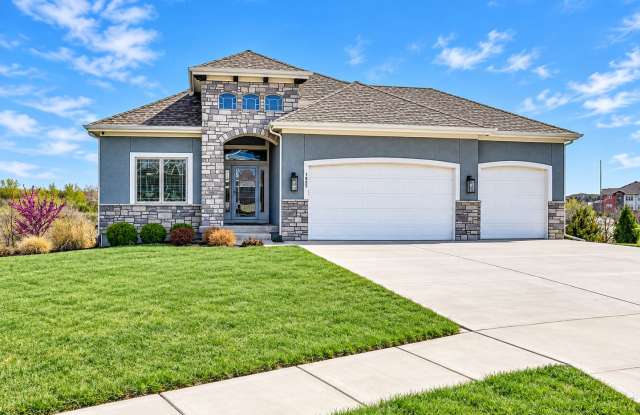 Stunning South Overland Park Home near Bluehawk! 4 Bedroom, 3 Bathroom Overland Park Home with Treed Backyard, 3-Car Garage & Resort-Style Community Amenities Gallery 1