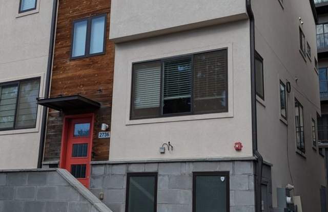 STUNNING 4-LEVEL TOWNHOME IN HIGHLANDS W/ 2-CAR GARAGE +AMAZING ROOFTOP DECK WITH VIEWS! Gallery 3