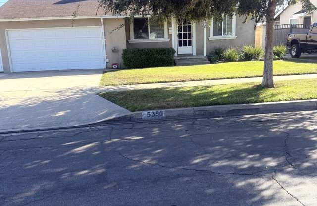 SPACIOUS & BREEZY HOME on a BEAUTIFUL TREE-LINED STREET! Gallery 3
