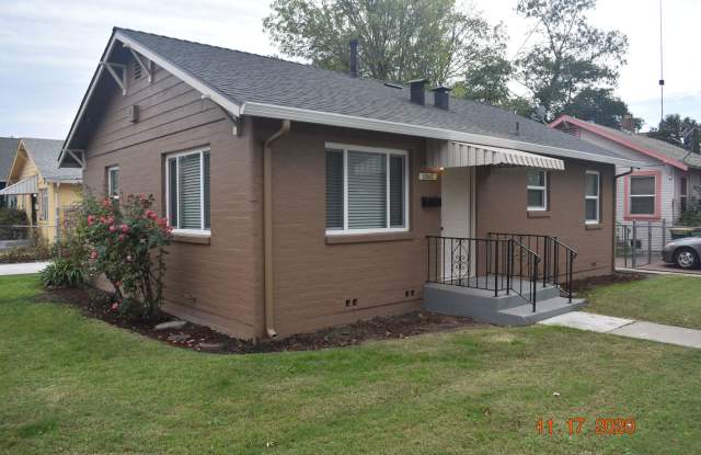 Darling Two Bedroom Home with all New Carpet/ Paint/ Dual Pane Windows/ Garage photos photos