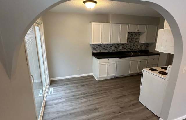 COMING SOON! Spacious 4 Bed, 2 Bath Home with Fenced Yard, Deck & Garage Gallery 4