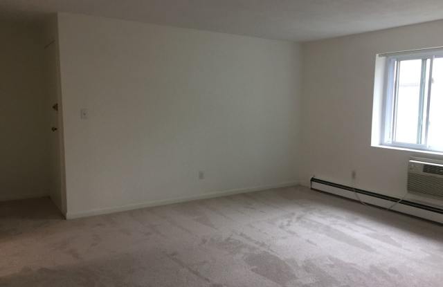 Two Bedroom with Heat & Parking Included Pet Friendly Top Floor photos photos