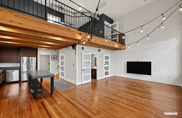 Huge Lofted Condo Overlooking Main Street Gallery 4