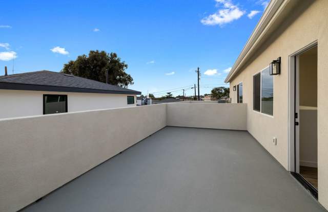 Spacious Remodeled 3BD/2BA with Massive Rooftop Deck, In-Unit W/D + Parking |Two Weeks of Free Rent!| Gallery 4