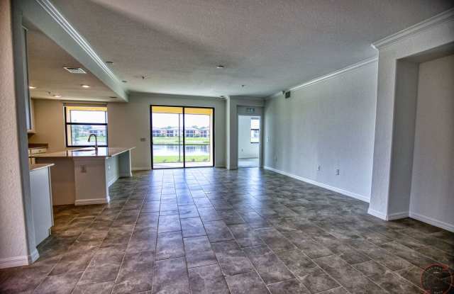 Annual Unfurnished Rental – Coach Home 3 Bedrooms, 2 Baths, 2 Car Garage, with Resort Like Amenities – Gran Paradiso Community! Gallery 4