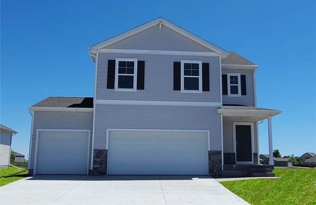 Contemporary Comfort: A Four-Bedroom Haven with Modern Flourish w/ 3 CAR GARAGE photos photos