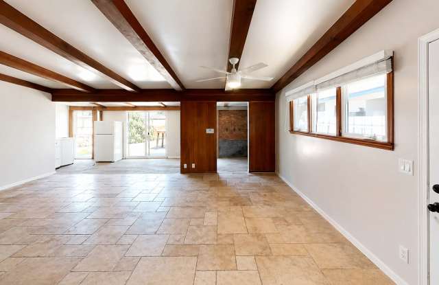 JACUZZI!! MASSIVE 5 BED 3 BATH HOME ON 63rd Gallery 3
