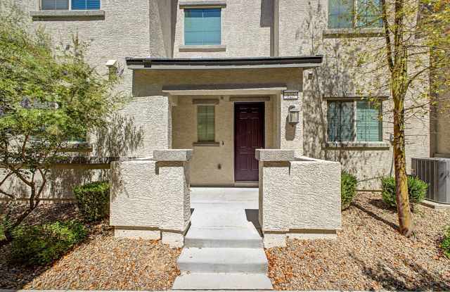 Beautiful corner lot townhome with custom paint, plentiful community green spaces. photos photos