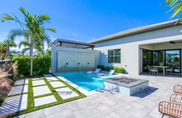 ** BRAND NEW CONSTRUCTION ULTRA-MODERN POOL HOME ** FURNISHED MODEL HOME 2/2 WITH OUTDOOR KITCHEN FOR ENTERTAINING ON LAKE ** photos photos