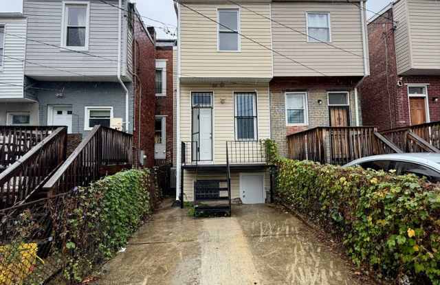 Fully Renovated 4-Bedroom Home with Primary Suite, Central Air & Rear Parking Gallery 3