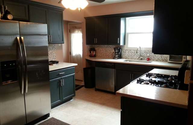 Modern 2 Bed/1 Bath row house with off-street parking! photos photos