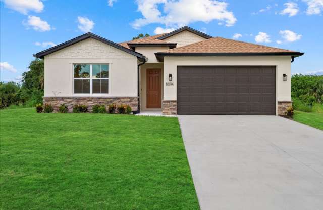 OCTOBER MOVE IN SPECIAL! Large 4/3 Brand NEW Corner Lot Home in Port Charlotte! - 1293 Preston Street, Port Charlotte, FL 33952