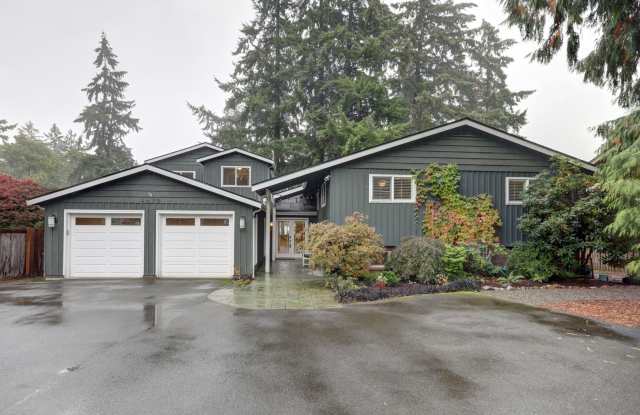 Mercer Island: 5-Bed, 4-Bath Home with Water Views, Large Yard, Updated Kitchen, Private Primary Suite Gallery 3