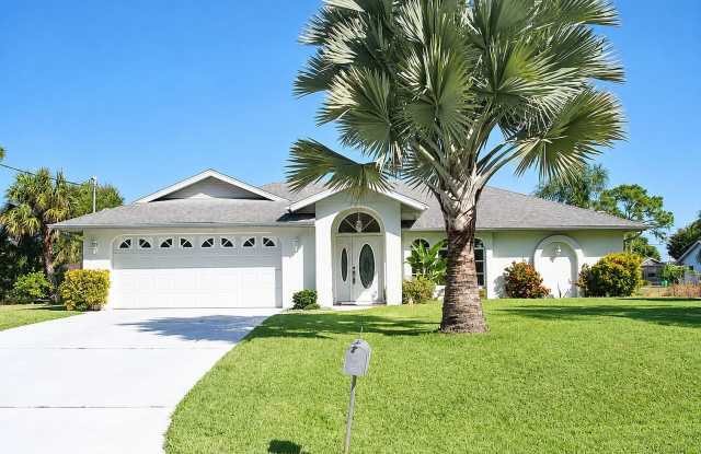 2BR/2BA Englewood Waterfront Home with Private Dock, Boat Lift & 2-Car Garage — $2,300/mo Gallery 1