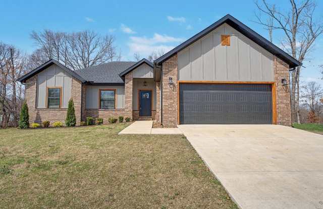 This home is a must-see in Bella Vista, offering a blend of comfort, functionality, and beauty that is hard to resist. photos photos