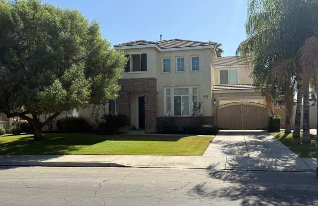 11013 Prairie Stone Place - Stunning SW 4 bedroom with SOLAR, theatre and sparkling pool! Gallery 1