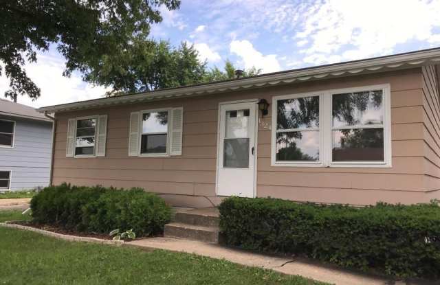 Check out this three-bedroom home with a Great Neighborhood - 1324 94th Avenue West, Rock Island, IL 61201