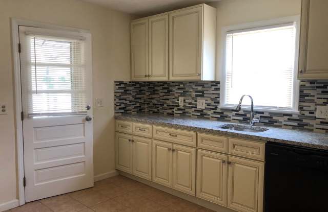 Charming 4 Bedroom Cape in Colonial Lake Neighborhood of Lawrence Twp.!! Recently Renovated Kitchen! Hardwood Floors! Large Back Deck and Yard! Gallery 3