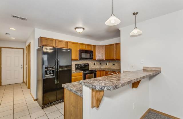 Spacious 3 bedroom 1 1/2 bath townhouse in Derby available NOW! - 310 North Osage Road, Derby, KS 67037