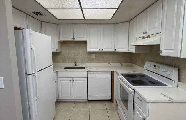 Enjoy comfortable living in this spacious 2-bedroom, 2-bathroom condo in a convenient Lauderhill location. photos photos