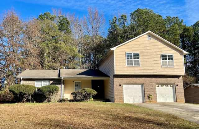 JUST REDUCED...UNDER $1,300!!-3 Bed/2 Bath Duplex With Attached Garage in Lovely College Park! photos photos