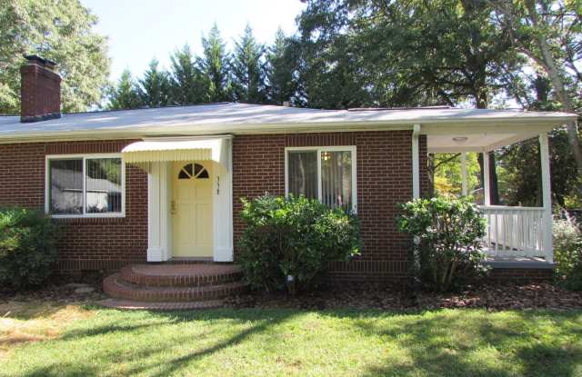 Spacious 2 Bed/1 Bath Duplex - Updated - Fireplace - Covered Side Porch - Water/Sewer/Trash Included photos photos