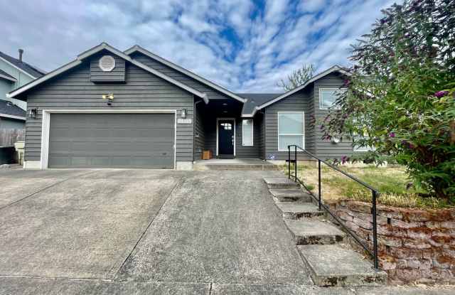 3 Bed/2 Bath Home. Fresh and Modern Interior. A/C, Garage, and Fenced Yard! photos photos