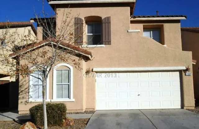 Stylish 4-Bedroom Home with Den, Fireplace  Desert Landscaping in 89052 photos photos