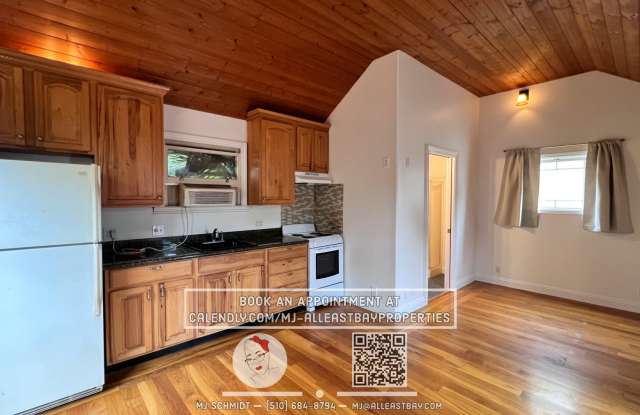 Quaint cottage with hardwood floors, private entrance and patio, surrounded by lush gardens! photos photos