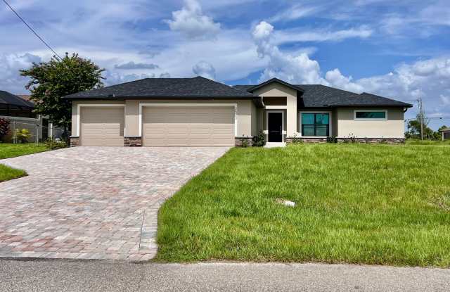 2523 NW 26th Ave. Cape Coral - Brand New Single House with 4 bed 2 bath 3 car garage and Fence photos photos