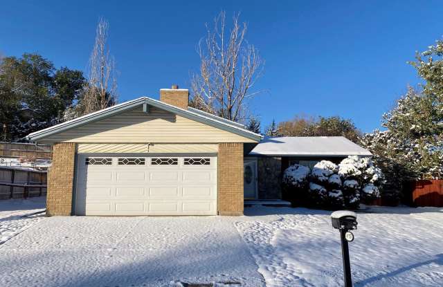 Spacious Tri-Level Home Featuring 4BD/2.5BA in Quiet Centennial Neighborhood. Updated Kitchen and Laminate Flooring! Large, Private Backyard! photos photos