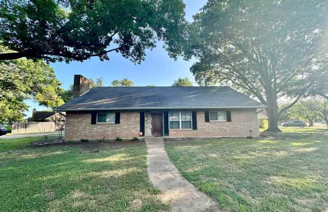 Available Now! Unique 4-Bedroom 2.5-Bath Corner Lot Home with Outdoor Kitchen & Detached Garage photos photos