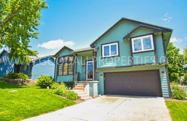 3 Bedroom 4 level split walkout 2.5 Bath In Pleasant View with fenced in yard - 245 Becky Lynn Boulevard, Pleasant Hill, IA 50327