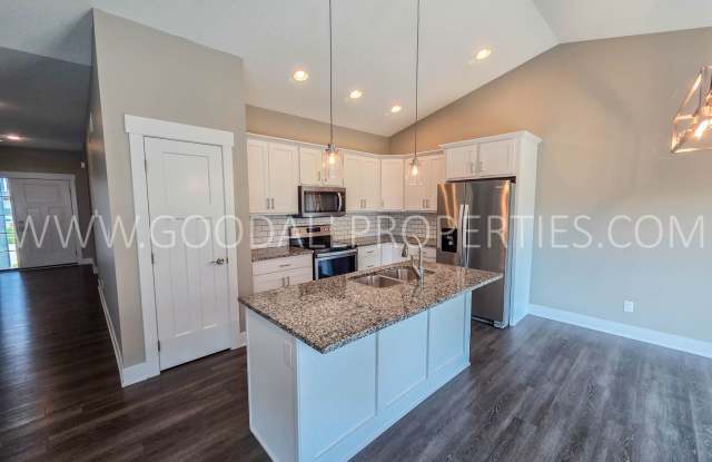 Spacious 4-Bedroom Clive Ranch with Finished Basement & 3-Car Garage Gallery 3