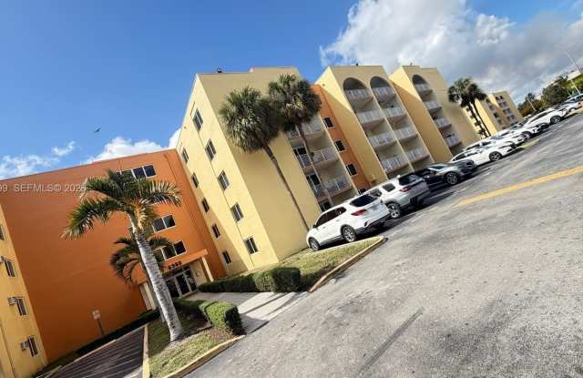 6980 NW 186th St - 6980 Northwest 186th Street, Country Club, FL 33015