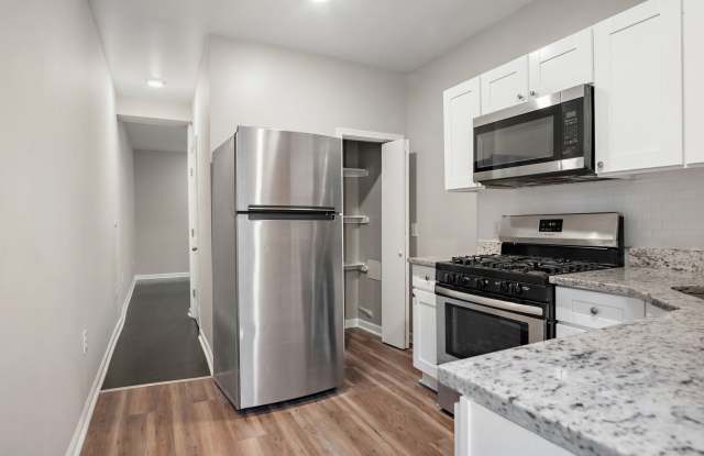 Spacious 3-Bedroom, 1-Bathroom home with Modern Amenities in East Baltimore! photos photos