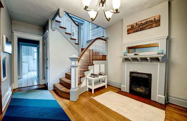 Beautiful two story unit with Victorian charm photos photos