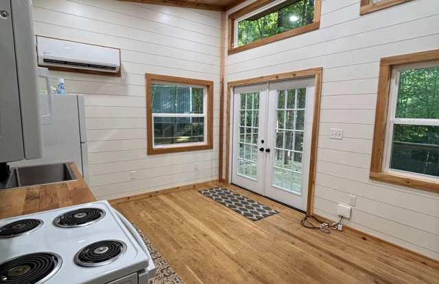 Cozy, Modern Tiny Home with Wrap-Around Porch - All-Inclusive Living in the Heart of Rutledge Gallery 3