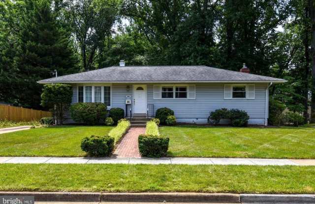 Tucked away in a serene setting surrounded by mature trees and a peaceful stream, this beautifully appointed residence offers both privacy and convenience with easy access to Route 66. photos photos